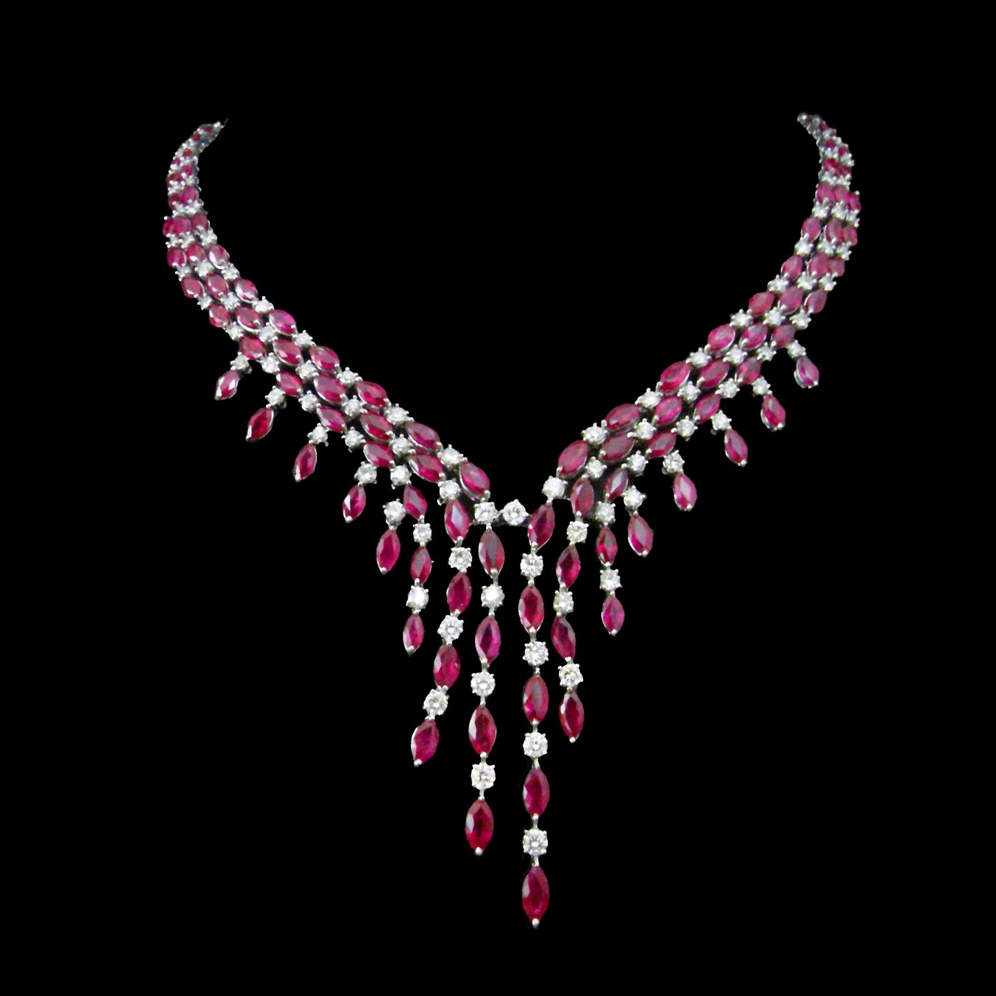18K White Gold tassel Necklace featuring Marquise Natural Burma Ruby and Round Natural Diamonds, elegantly cascading for a refined and timeless design