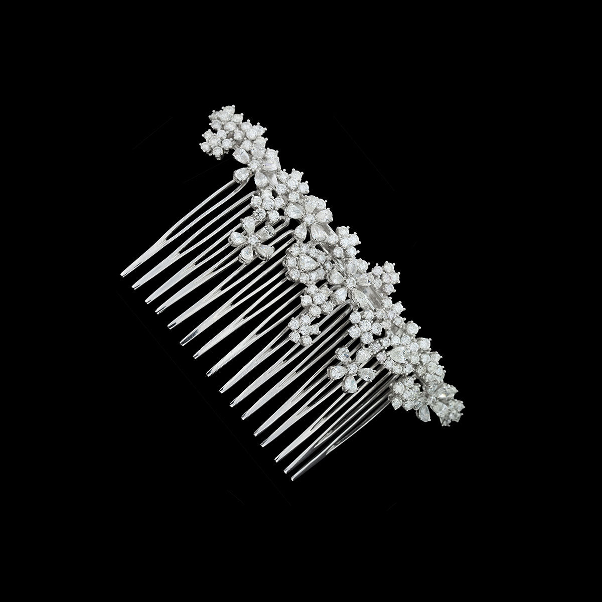 Hair comb, crafted in 18K White Gold, set with 5.40ct of Natural Round Diamonds and 3.53ct of Natural Pear-Shaped Diamonds.
