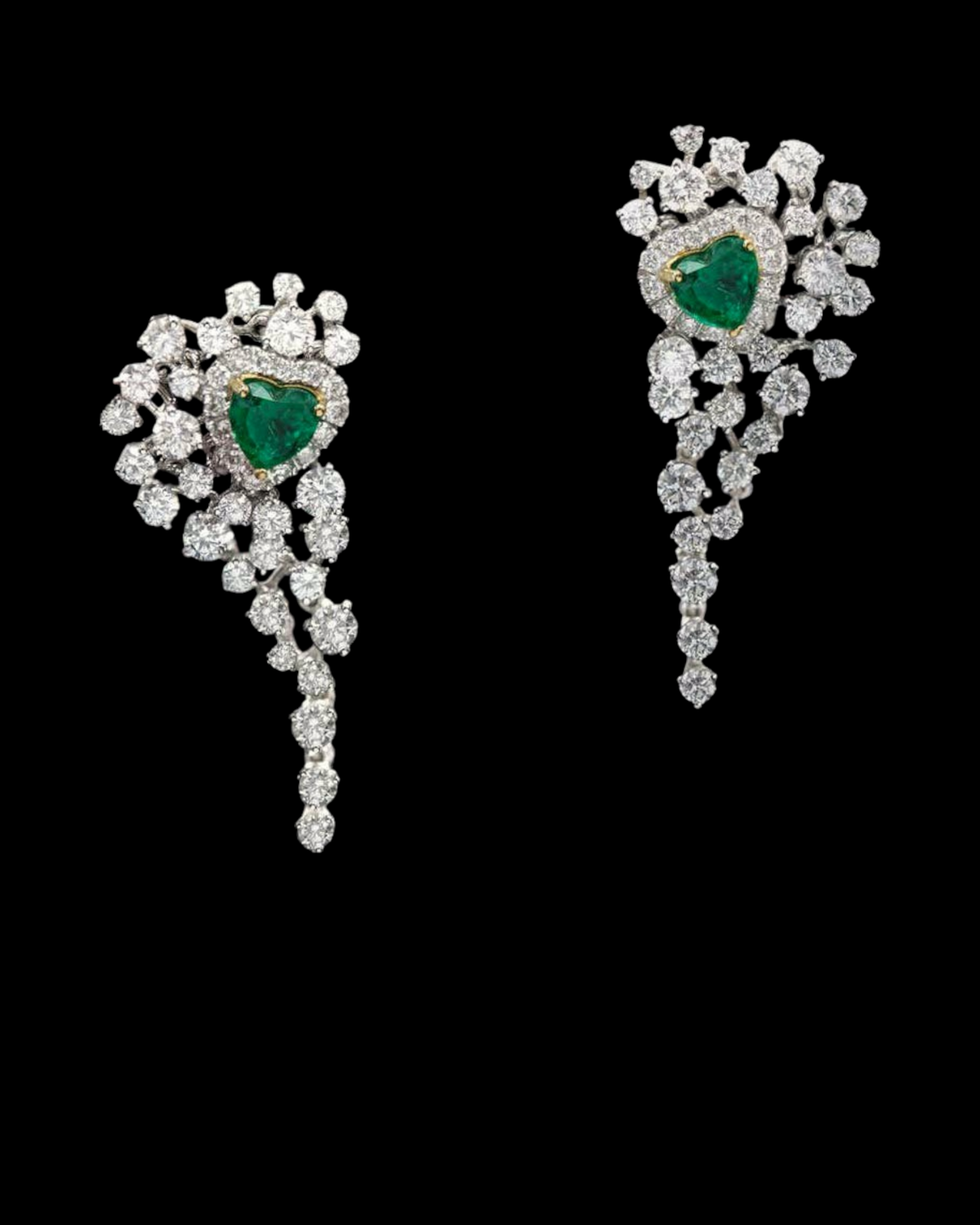hofjewellery heart-shaped Colombian emerald and diamond drop earrings in 18K white gold on a black background