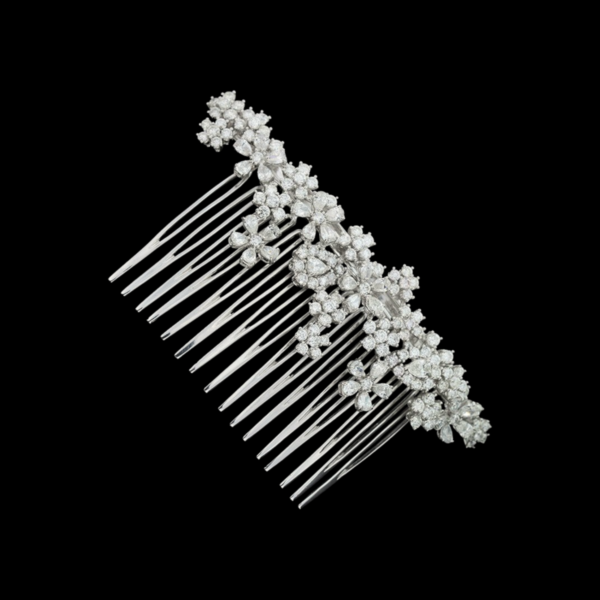 hofjewellery 18K white gold floral hair comb featuring round and pear-shaped diamonds for bridal or formal wear.