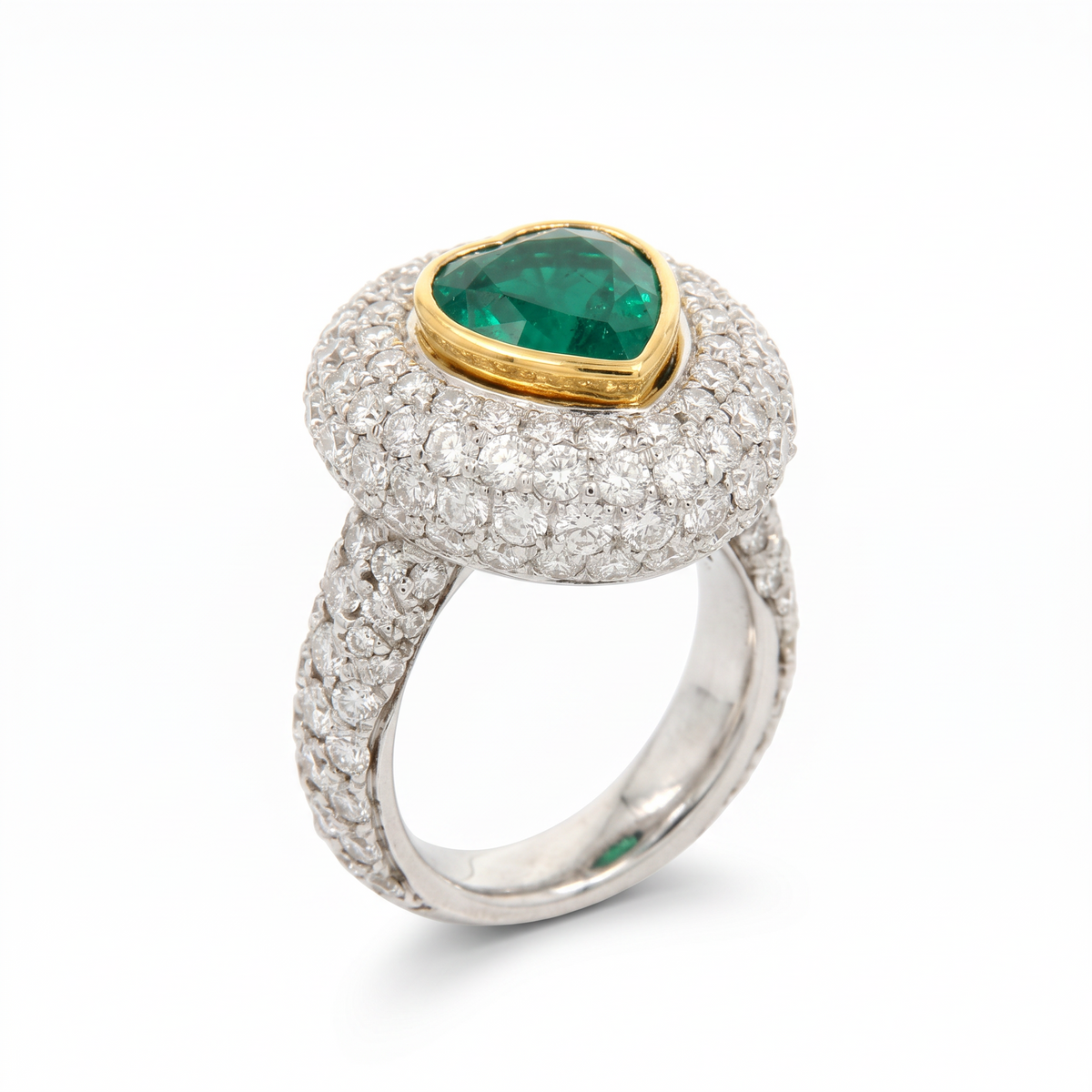 hofjewellery 18K white gold ring featuring a pear-shaped Colombian emerald in a diamond halo and pavé-set band.