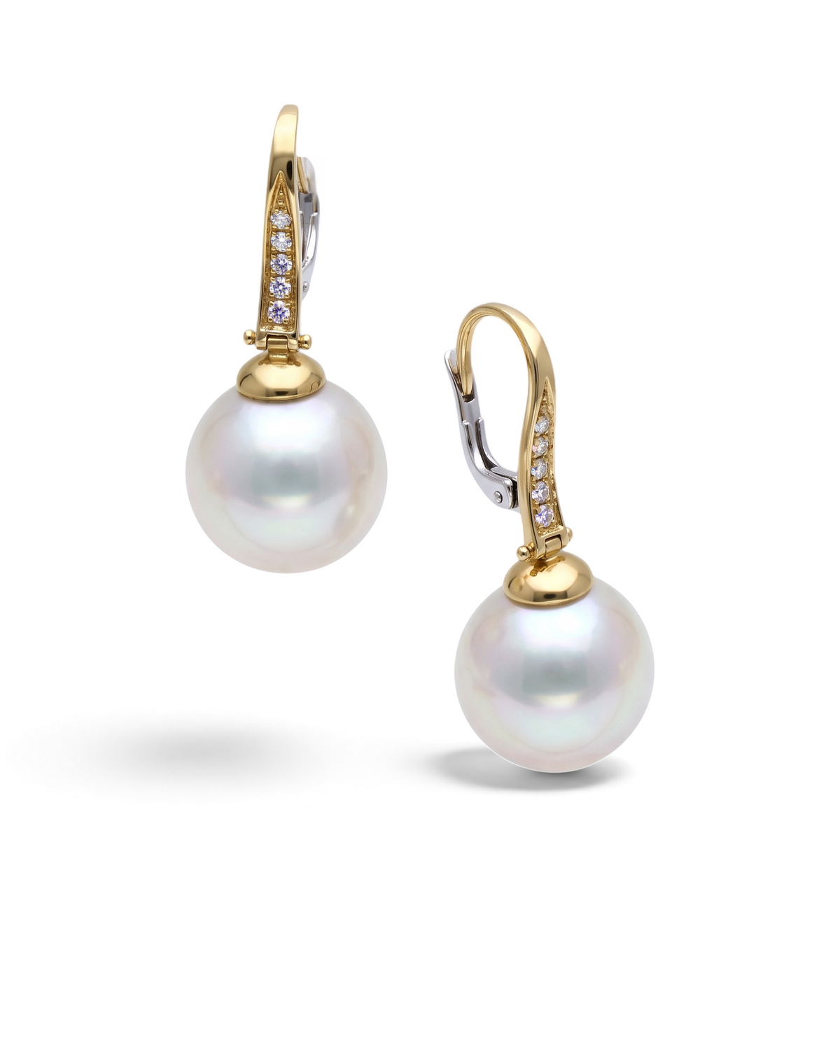 hofjewellery Peal Drops earrings featuring South Sea pearls set in 18K yellow gold with round brilliant diamonds.