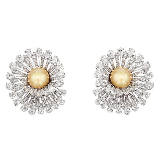 18K White Gold Earrings featuring 2 South Sea Golden Pearls, 9.78ct Pear-Shaped and 1.48ct Round Natural Diamonds in a bold, three-dimensional swirl vortex design.