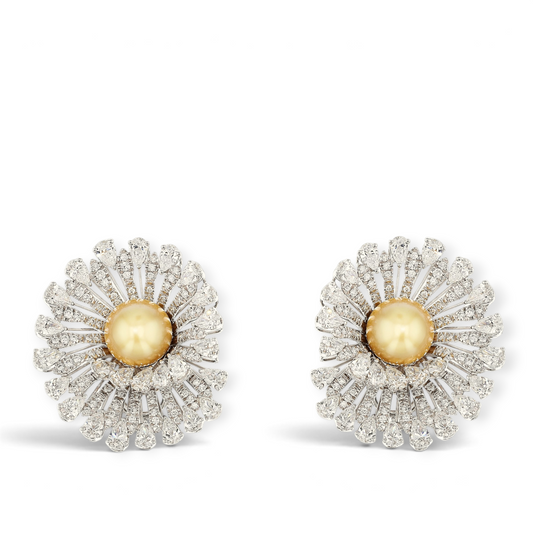 18K White Gold Earrings featuring 2 South Sea Golden Pearls, 9.78ct Pear-Shaped and 1.48ct Round Natural Diamonds in a bold, three-dimensional swirl vortex design.