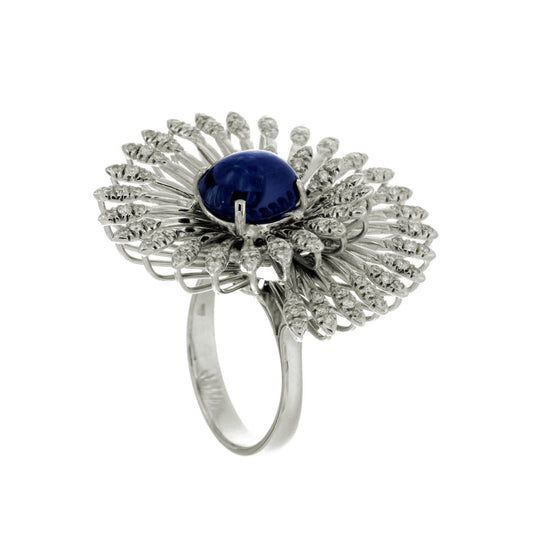 18K White Gold Swirl Vortex Ring featuring a 3.82ct Cabochon Sapphire, 0.81ct Round Natural Diamonds, and 14.15 grams of gold.