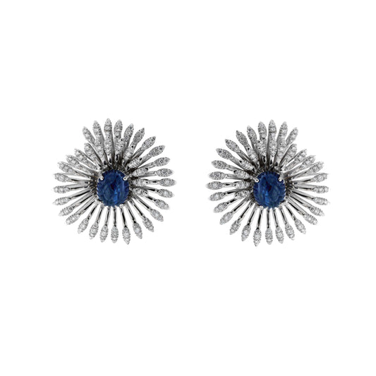 18K White Gold earrings featuring 7.30ct Cabochon Sapphires, 1.68ct Round Natural Diamonds, and a swirl vortex design.