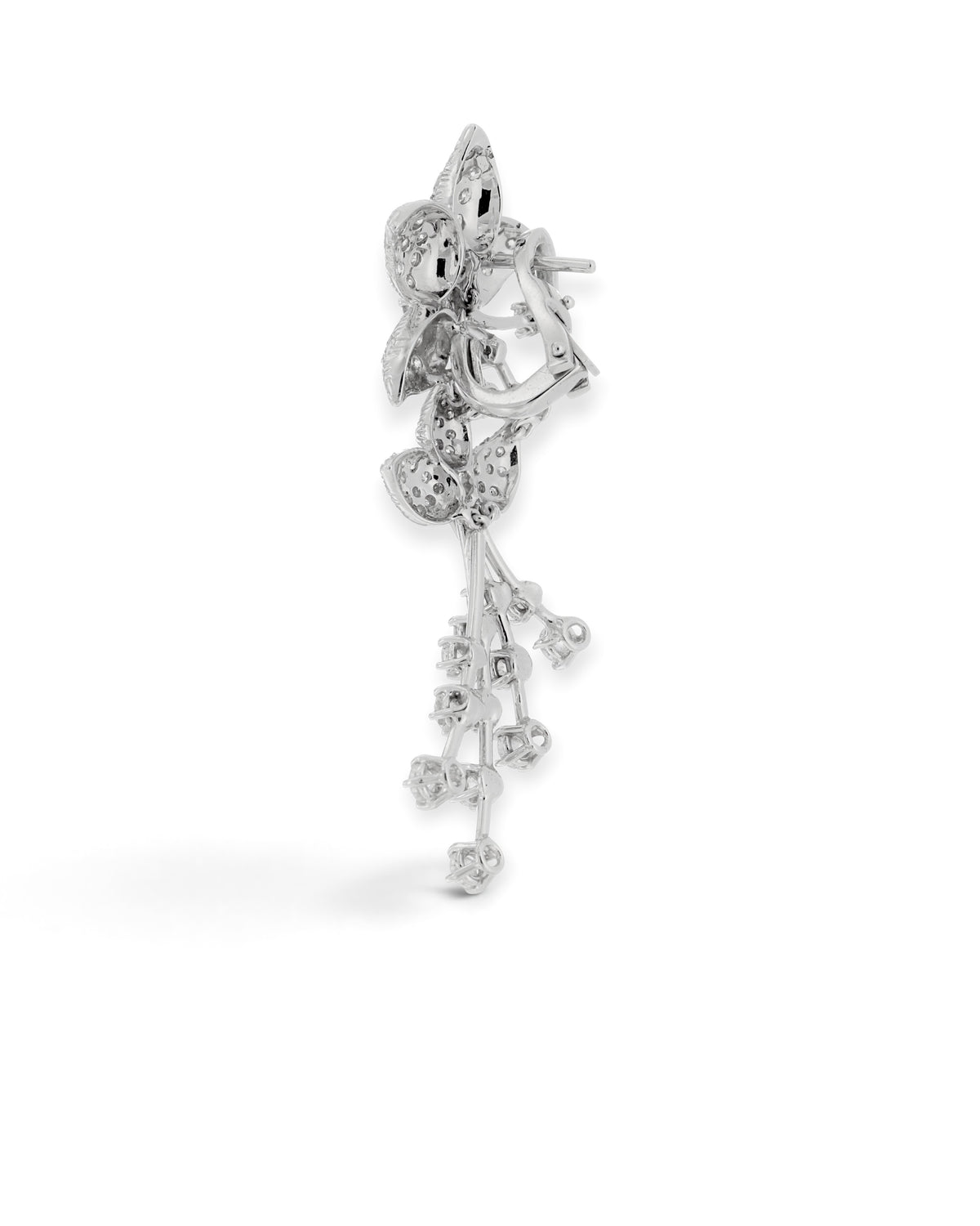 Back view of a floral diamond drop earring in 18K white gold, showing the openwork settings and fastening, reference 1030E.