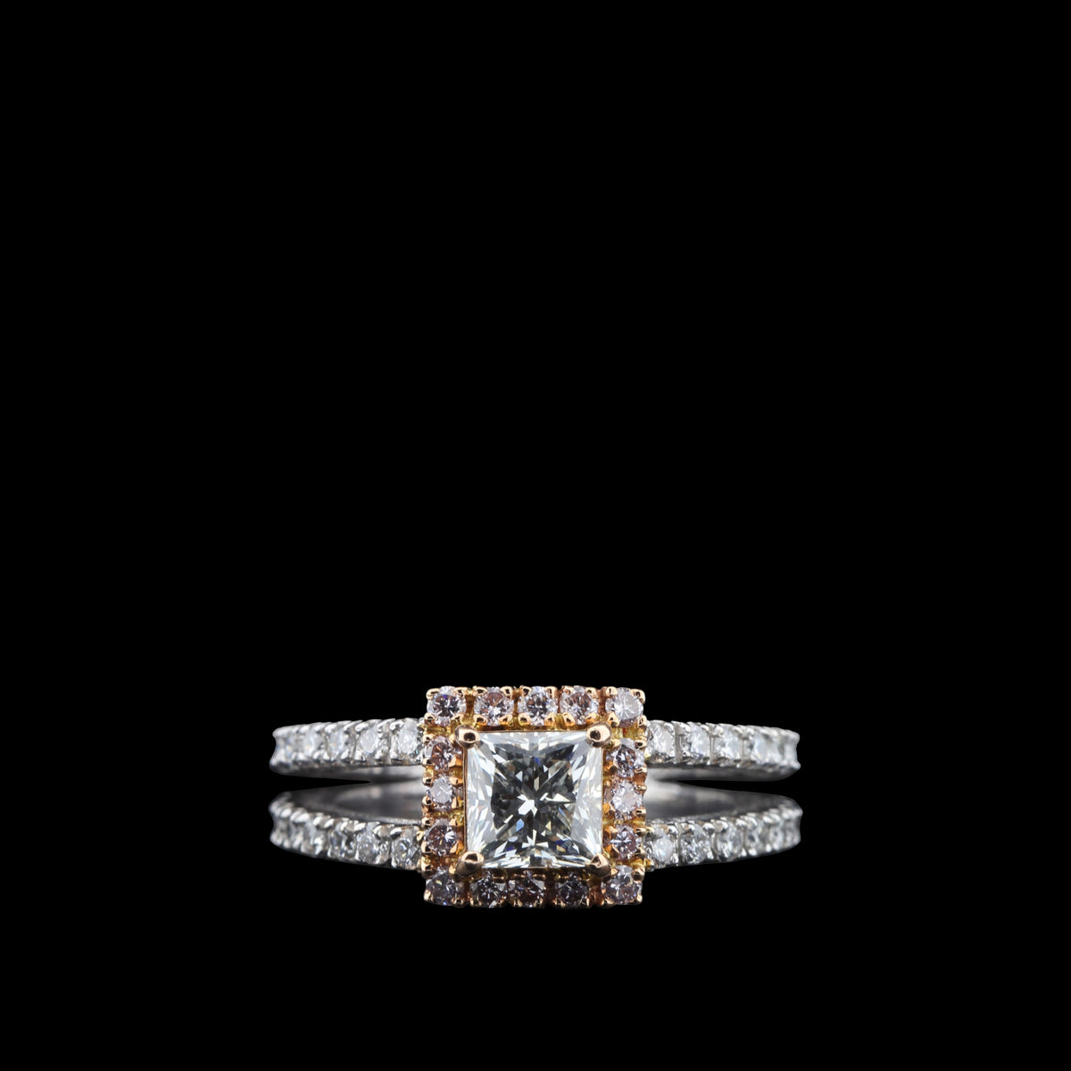 Princess-cut diamond halo ring with a split band in 18K rose and white gold, reference 1938RS.