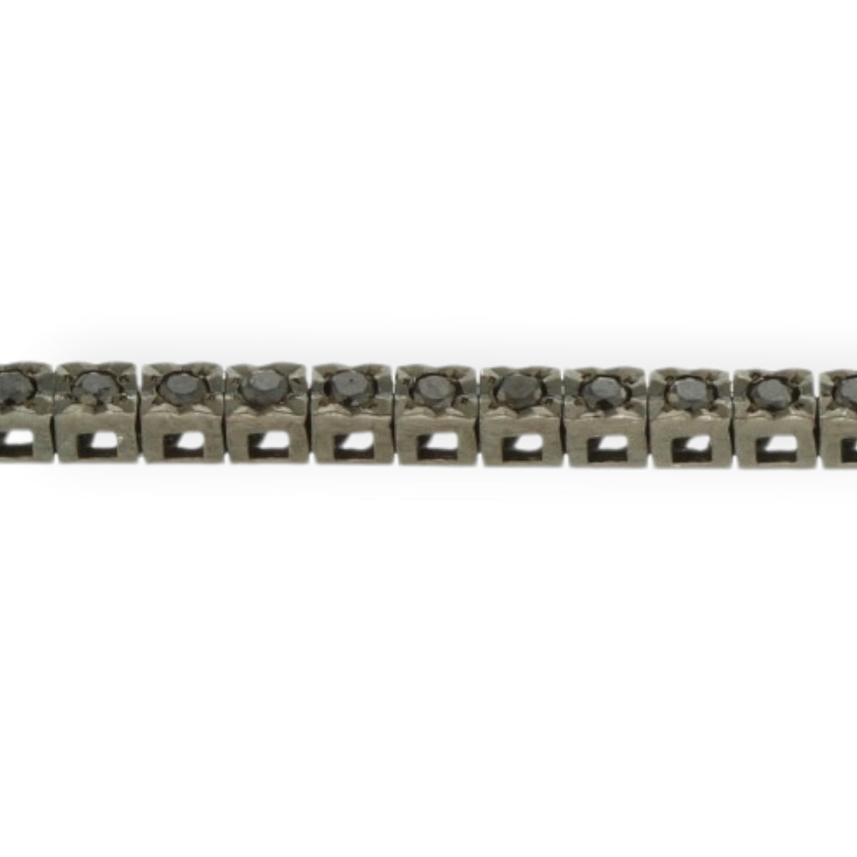 Close-up side detail of the black diamond tennis bracelet in 18K black gold, showing its linked stone settings, reference 2370B.
