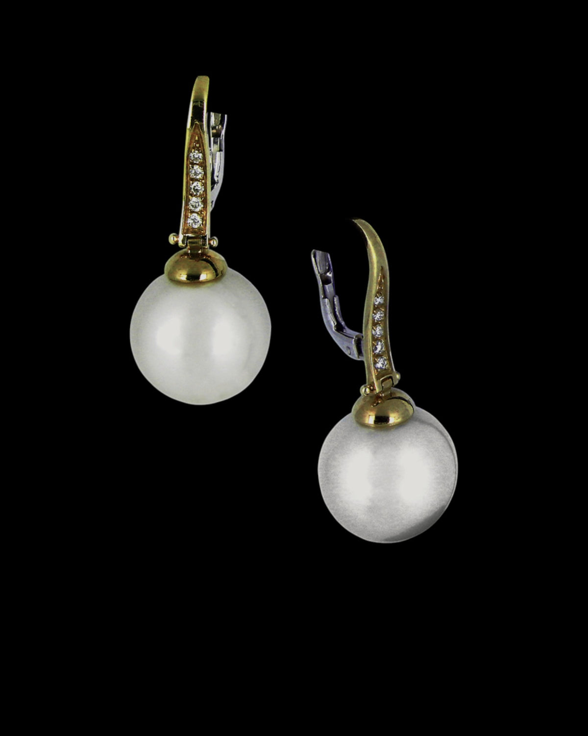 South Sea pearl drop earrings with diamond-set hooks in 18K yellow gold, reference 239E.