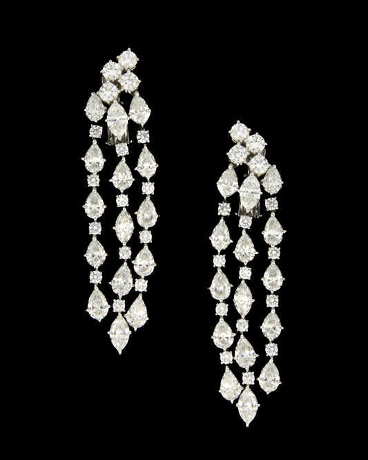 Bullicula cascading tassel earrings with pear-shaped, marquise and round diamonds in 18K white gold, reference 556E.