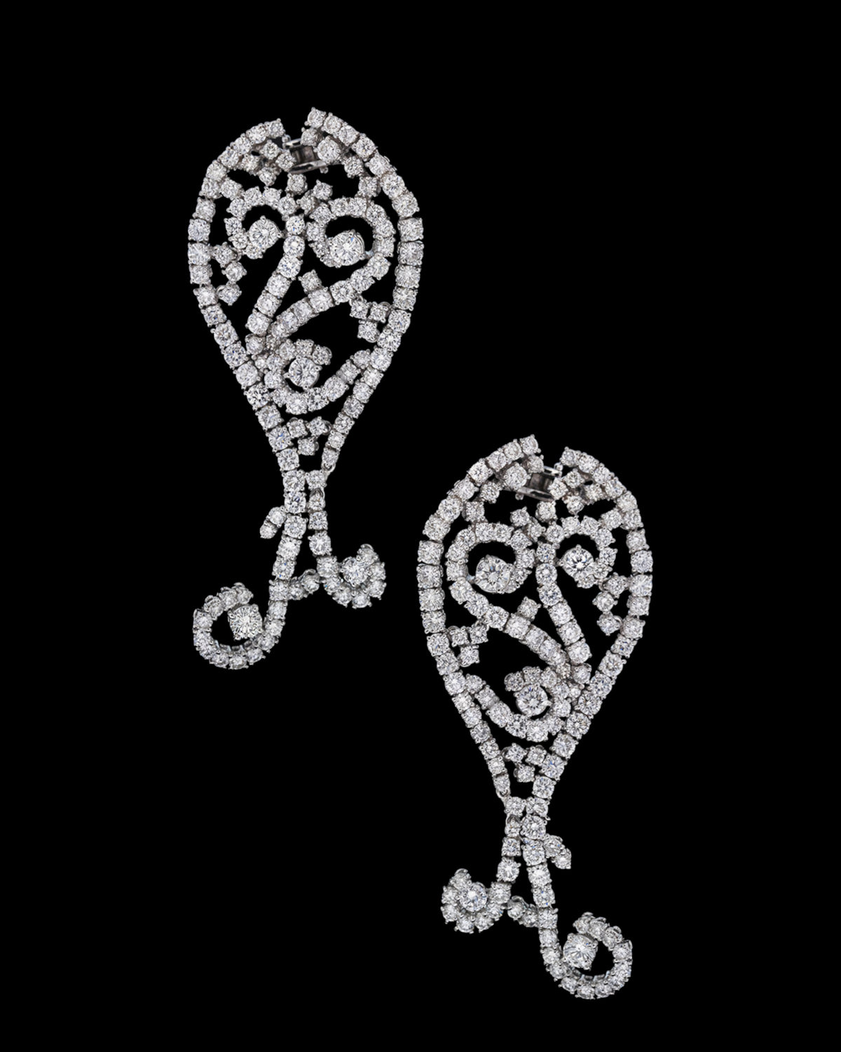 Ornate diamond filigree drop earrings with scrolling openwork in 18K white gold, reference 917E.