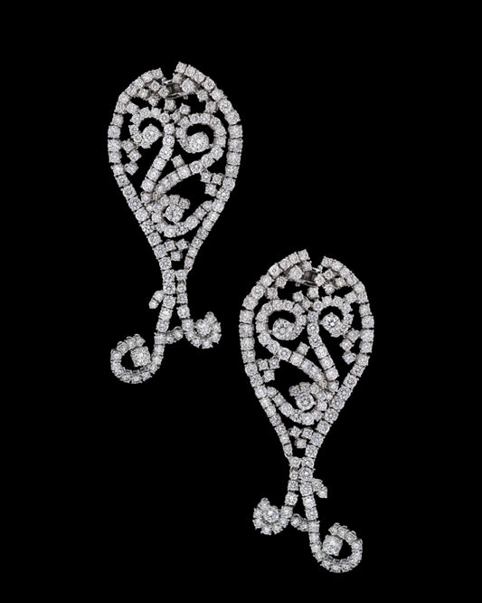Ornate diamond filigree drop earrings with scrolling openwork in 18K white gold, reference 917E.