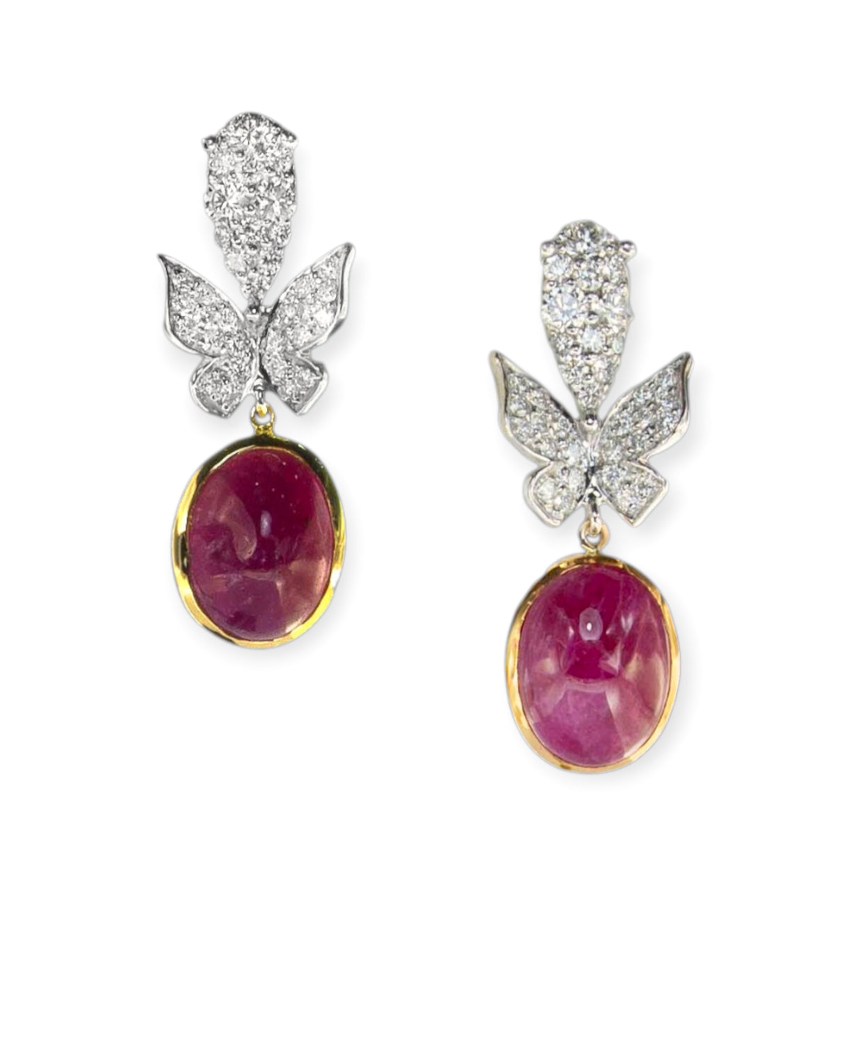 Cabochon ruby drop earrings with diamond-set leaf motifs in 18K yellow and white gold, reference ER0054.
