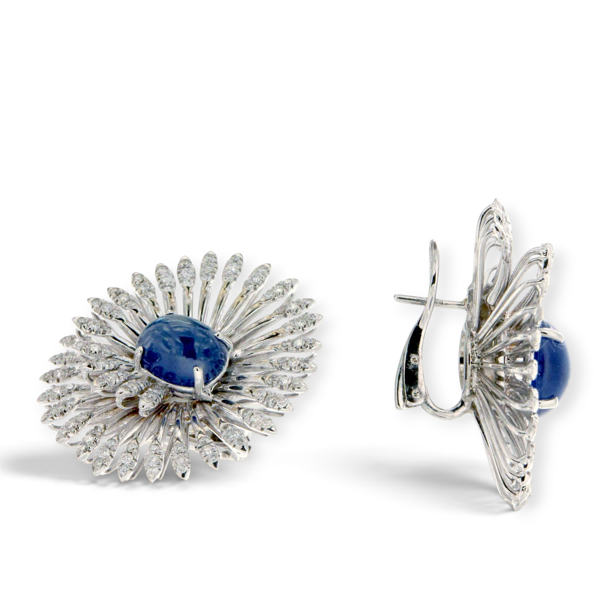 hofjewellery 18K white gold swirl earrings featuring cabochon sapphires and round diamonds in a sunburst design.