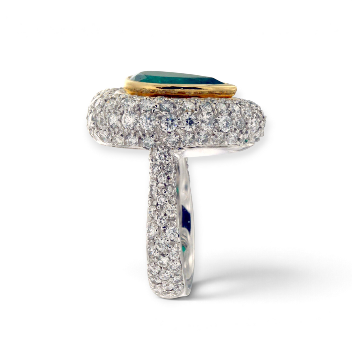 hofjewellery pear-shaped Colombian emerald ring with diamond halo and pavé band in 18K white gold, side profile view