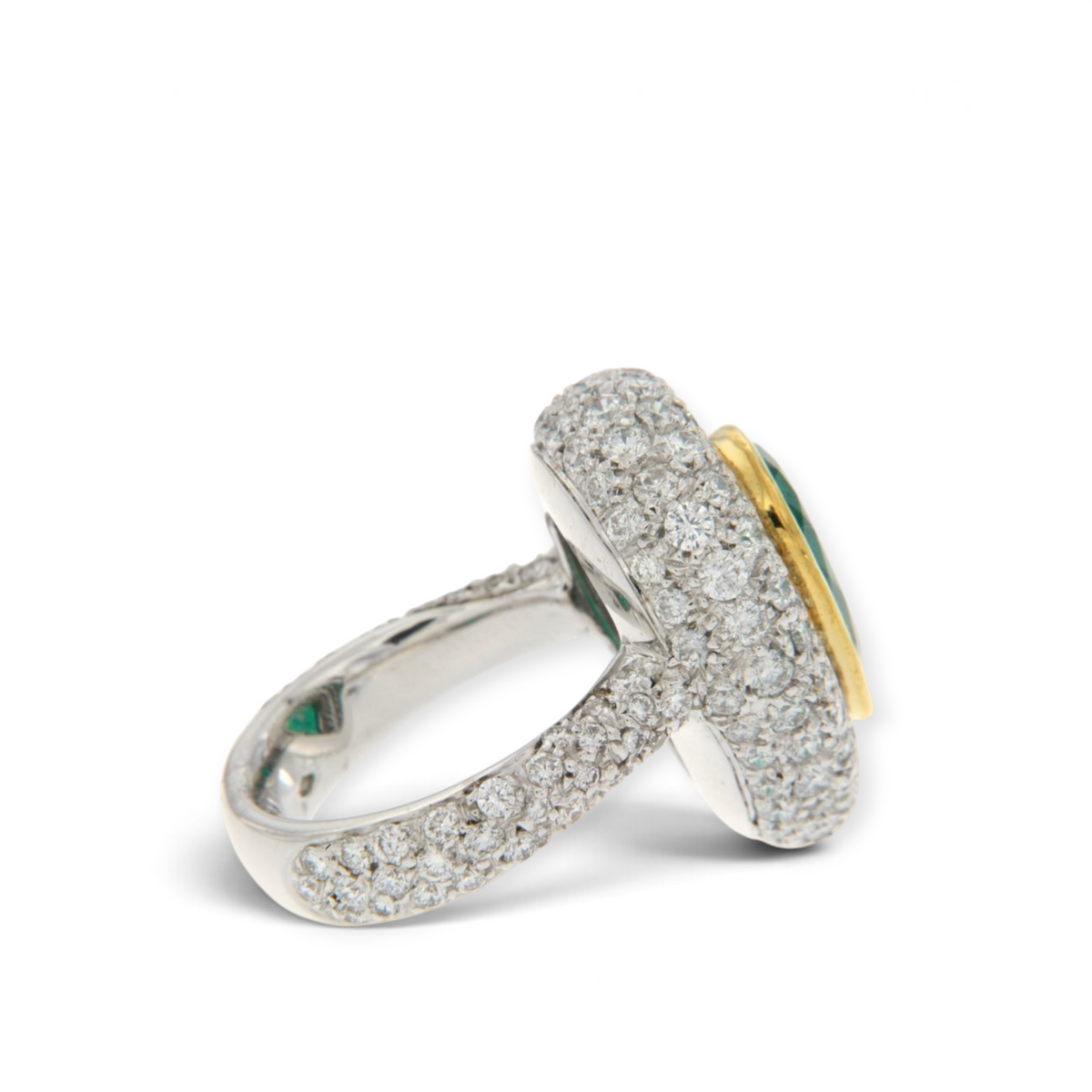 hofjewellery pear-shaped Colombian emerald ring with a diamond halo and pavé-set band in 18K white gold