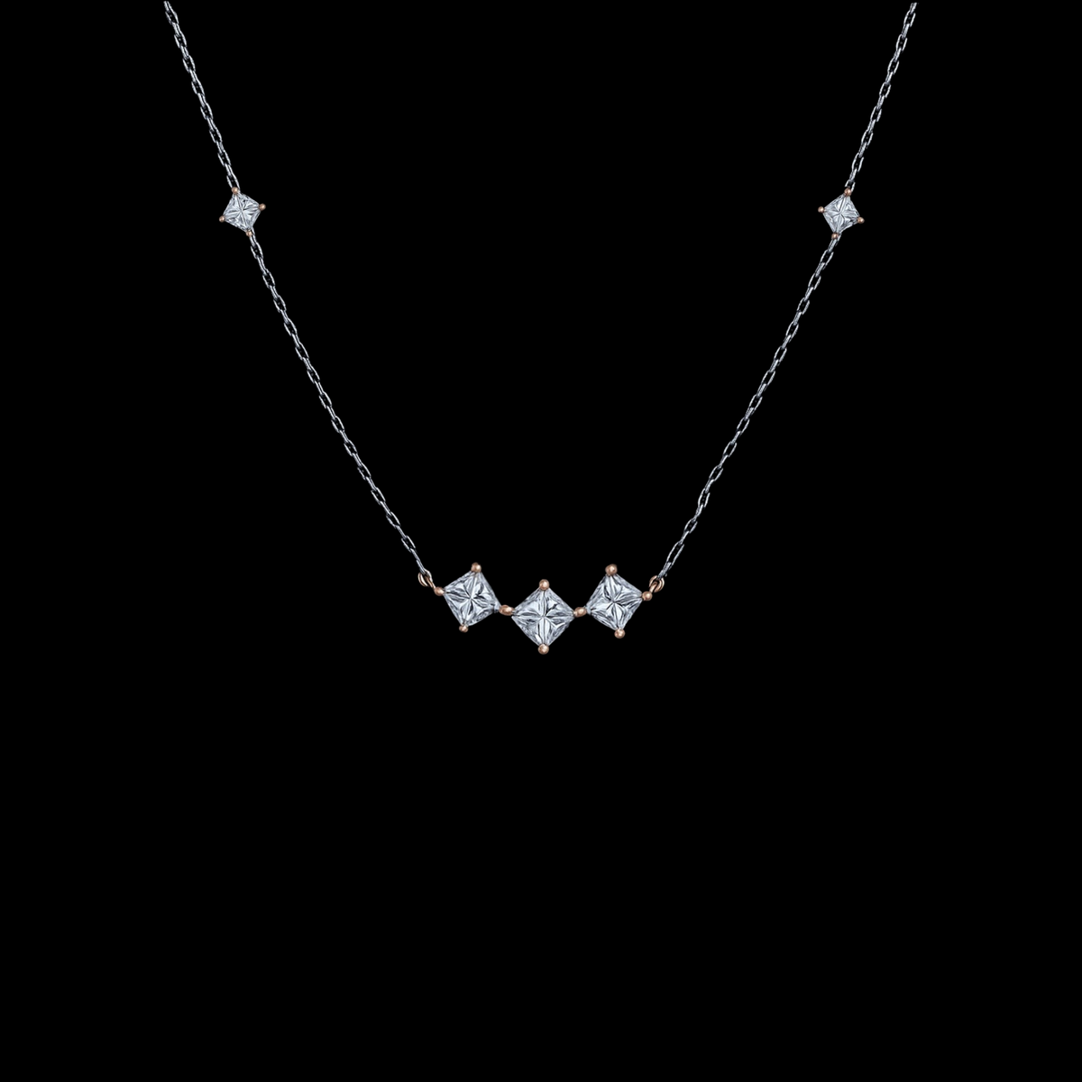 hofjewellery princess-cut diamond necklace in 18K rose and white gold with a delicate chain on a black background