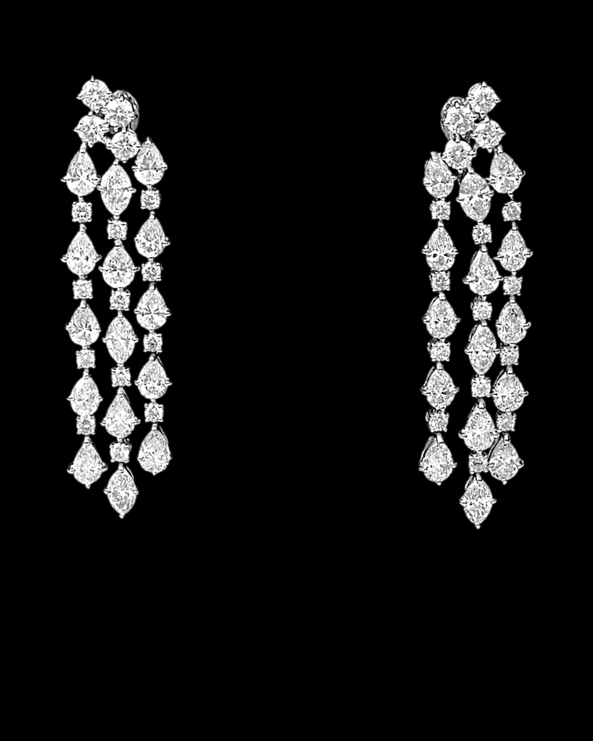 hofjewellery 18K white gold tassel earrings with 22.62 carats of mixed-cut pear, marquise, and round diamonds.