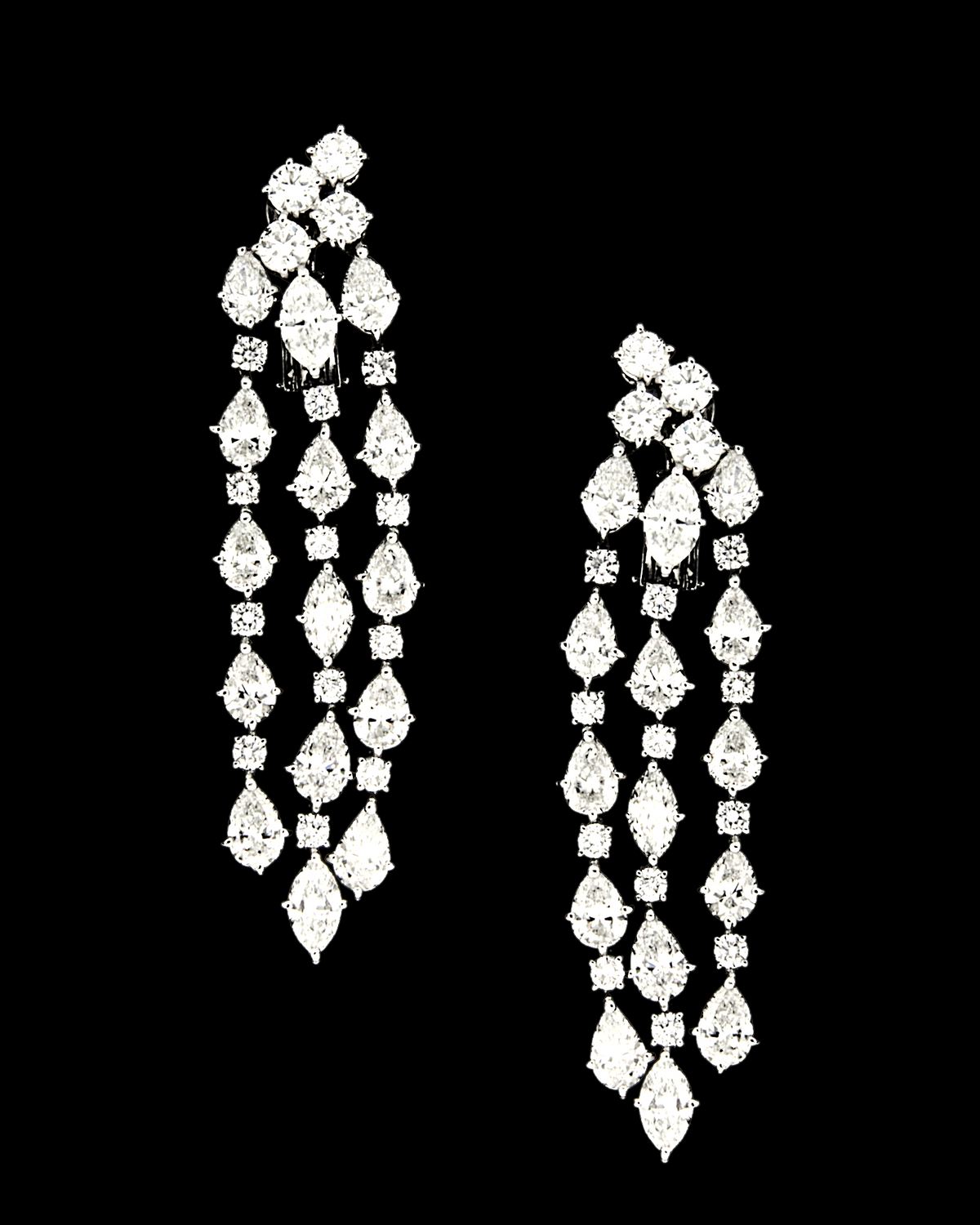 hofjewellery Bullicula 18K white gold tassel earrings with 22.62 carats of pear, marquise, and round cut diamonds.